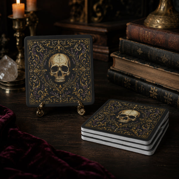 A stack of gothic-themed soapstone coasters with a skull and ornate gold damask pattern on a dark background, displayed on a dark wooden table next to old books, a candle, and a crystal ball.