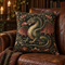 Medieval dragon woven tapestry cushion with botanical floral pattern in dark green red and gold